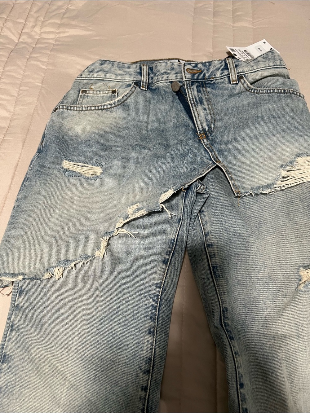 Light Blue Distressed Women’s Jeans